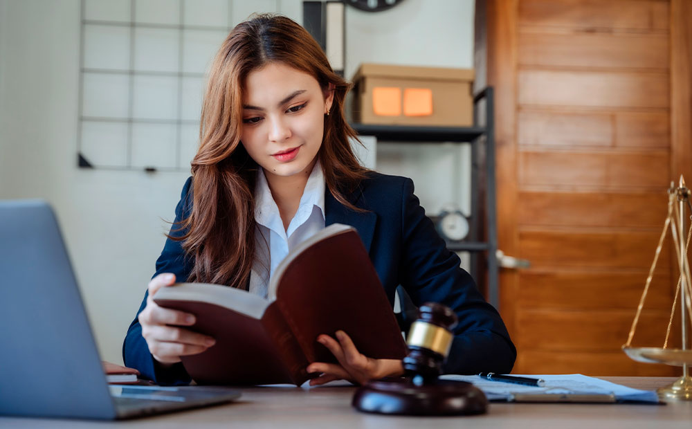 female attorney working at her office